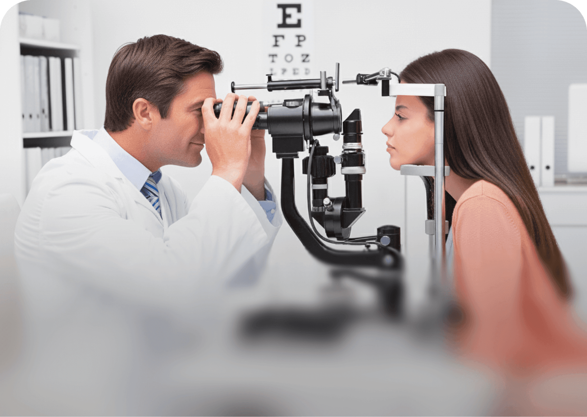 Optometrist using a slit lamp to perform a detailed anterior eye health examination on a patient, showcasing the comprehensive Dresden Vision Australia eye test services.