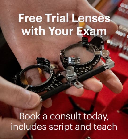 Dresden Vision optometrist holding trial lenses during eye exam to determine accurate prescription for glasses