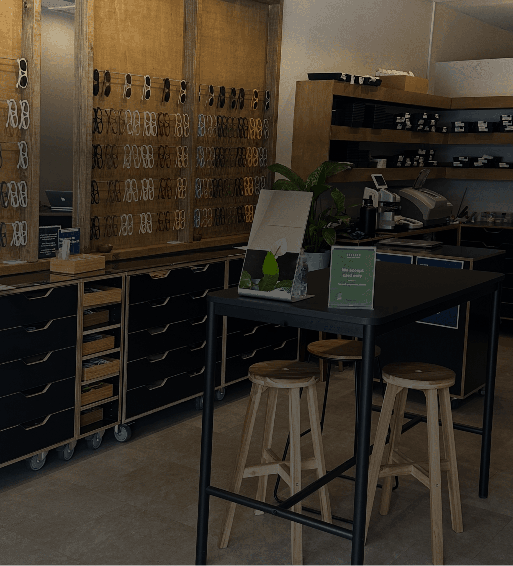 Dresden Vision Australia store interior showcasing eyewear display with multiple glasses frames on shelves.